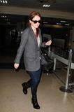 th_70399_Preppie_-_Julianne_Moore_at_LAX_Airport_-_Jan._14_2010_155_122_374lo.jpg
